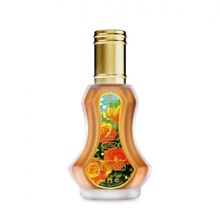 Amberkleurige parfum bakhour fles met gouden dop en bloemige parfum aroma
