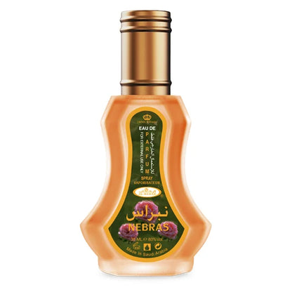 Peachkleurige Al-Rehab parfum Nebras met gouden dop, ideaal voor parfum Nebras fans