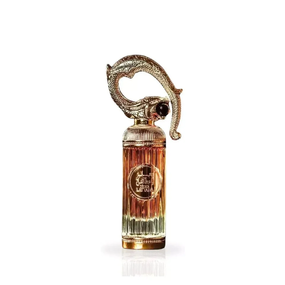 Elaborate Sehr Lattafa Arabische Parfumolie met gouden en bruine fles en draakdop
