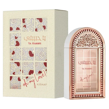 Ya Habibti rosegoud parfumfles met Asad Elixir bloemmotief en hartuitsparingen